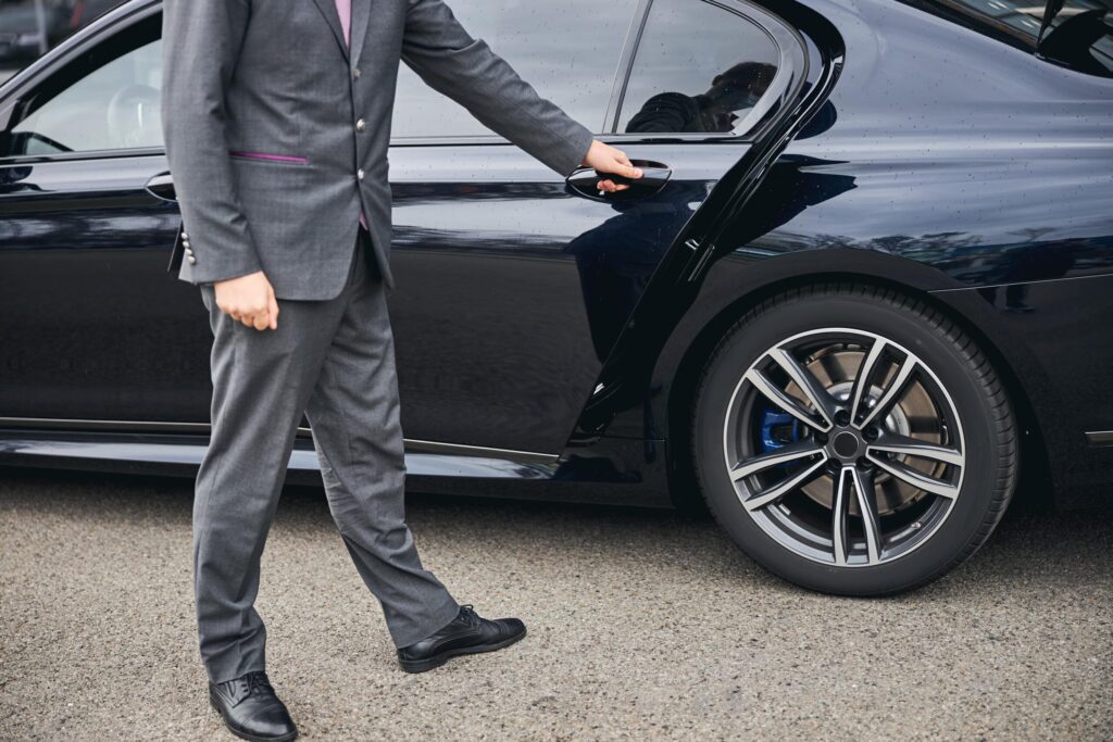 Airport Transfers: Taxis, Shuttles, and Private Cars | Elect Chauffeurs professional airport chauffeurs
