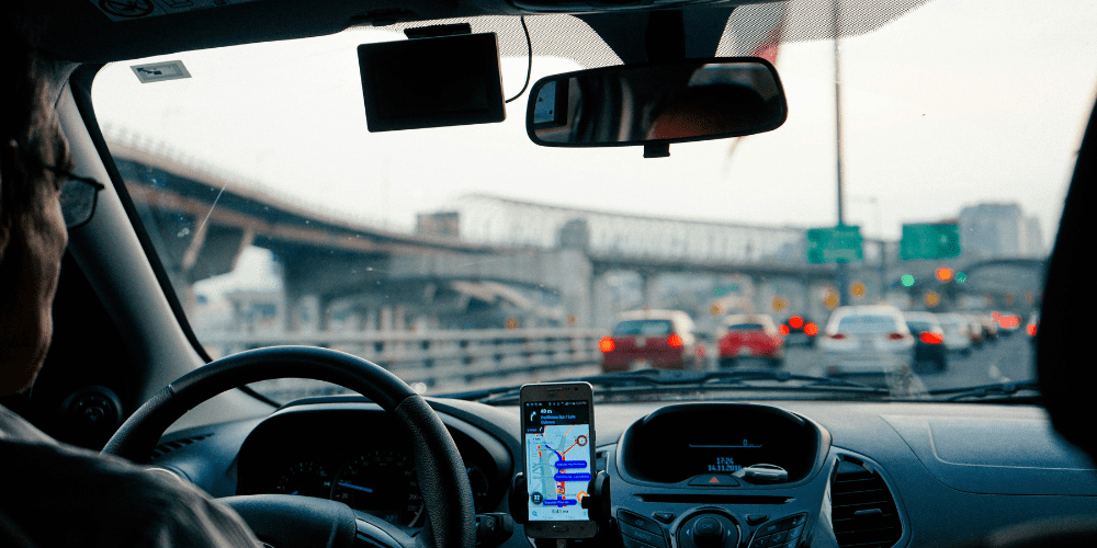Beating the Belfast Rush: Why Hiring a Chauffeur is Your Best Move | Elect Chauffeurs Chauffeur in rush hour traffic.